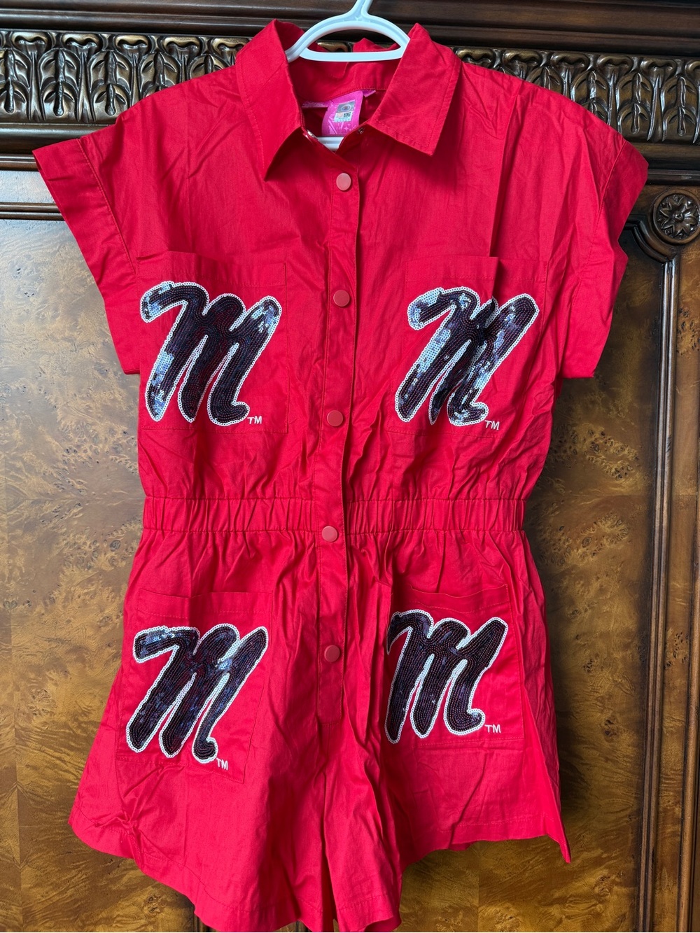 QUEEN OF SPARKLES Red Short Sleeve Romper with 'M' Appliqués